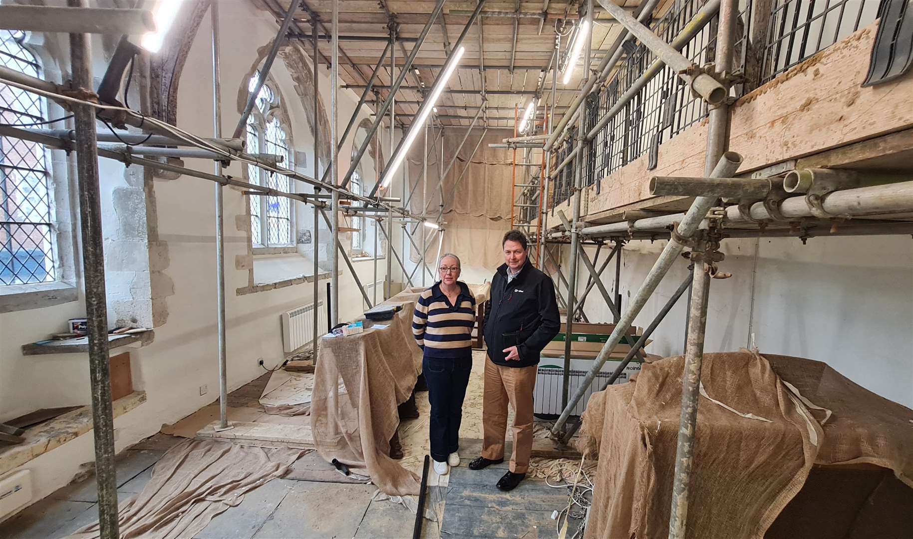 Eastbridge Hospital clerk and receiver Louise Knight with trustee Nick Rooke in the upper chapel which is undergoing restoration
