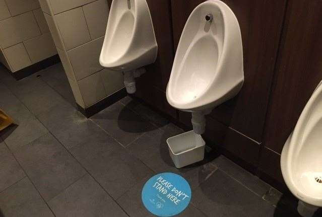 The polite request not to use the central urinal is presumably due to Covid precautions rather than the result of a leak