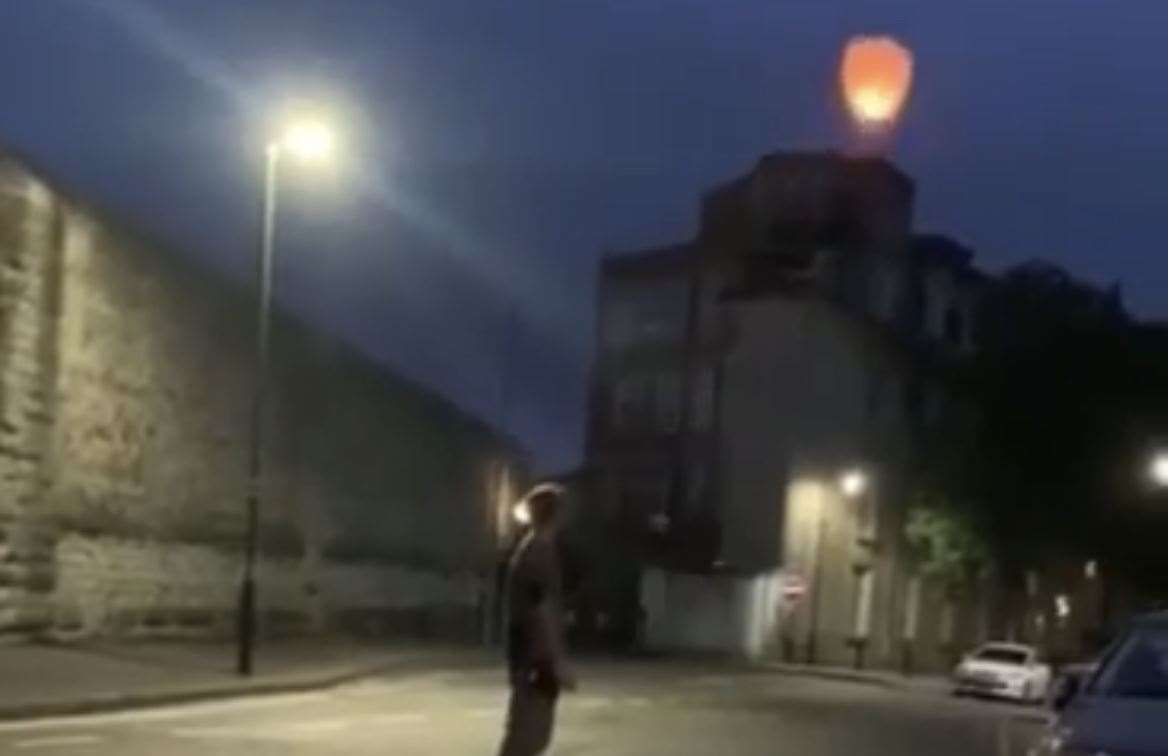 Friends and family clapped as the lantern made its way into the sky. Picture: Jay Ryan