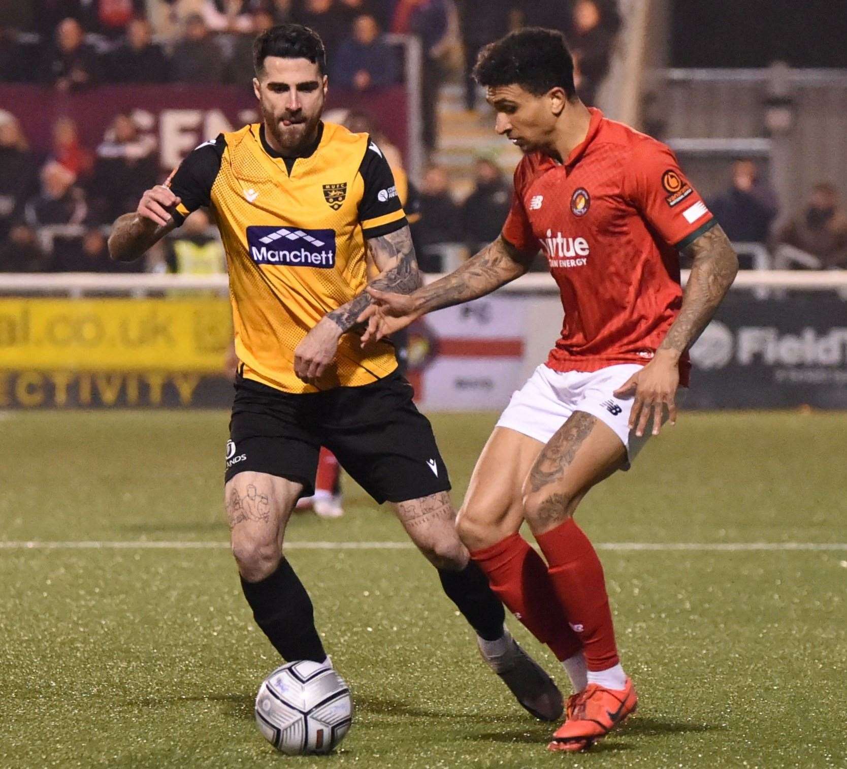 Ebbsfleet's Tobi Adebayo-Rowling takes on Maidstone's Joan Luque during Fleet's 4-0 defeat at the Gallagher on Tuesday. Picture: Steve Terrell