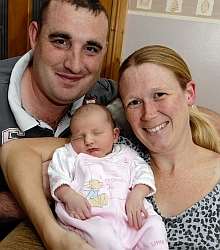 Baby Charlotte with mum and dad Jo and Lee Berrill. Charlotte was born in just 38 minutes.
