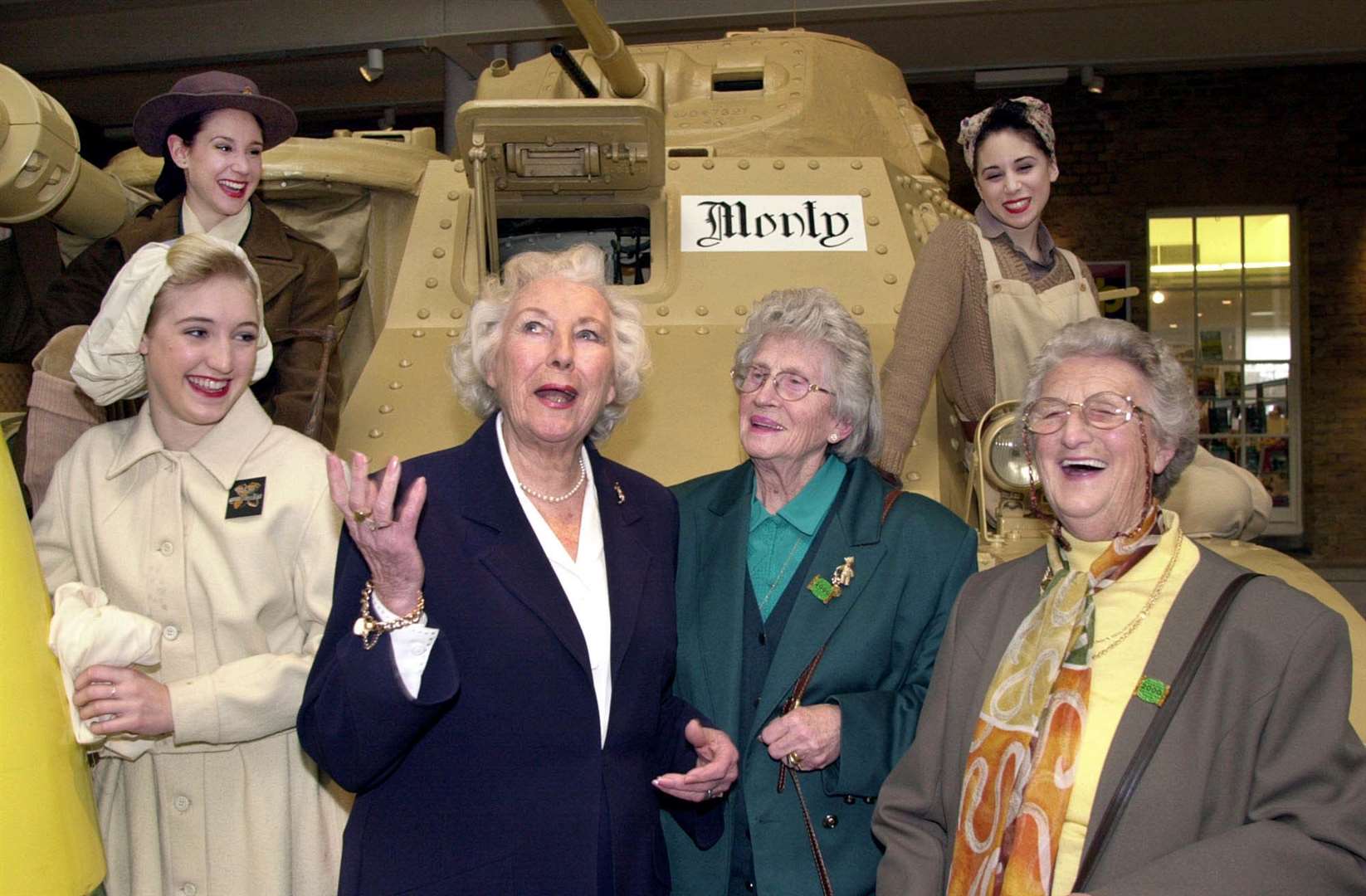 With former land girls at the Imperial War Museum (PA)