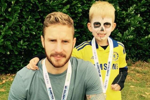 Jayden-Tyler with family friend Liam Morris after a fundraising run for Diabetes UK