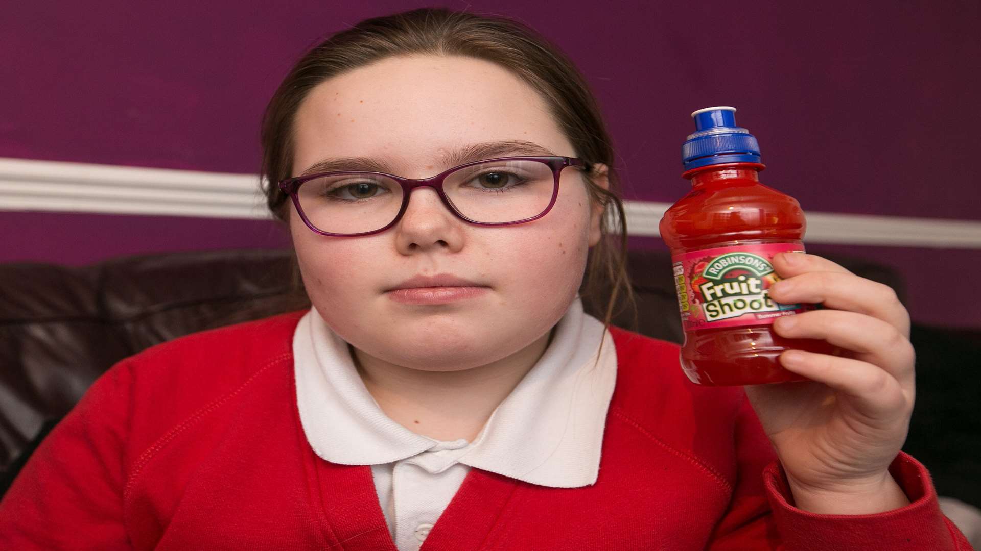 Ellie Robinson-Smith says she became sick when she drank the Fruit Shoot. Picture: SWNS.