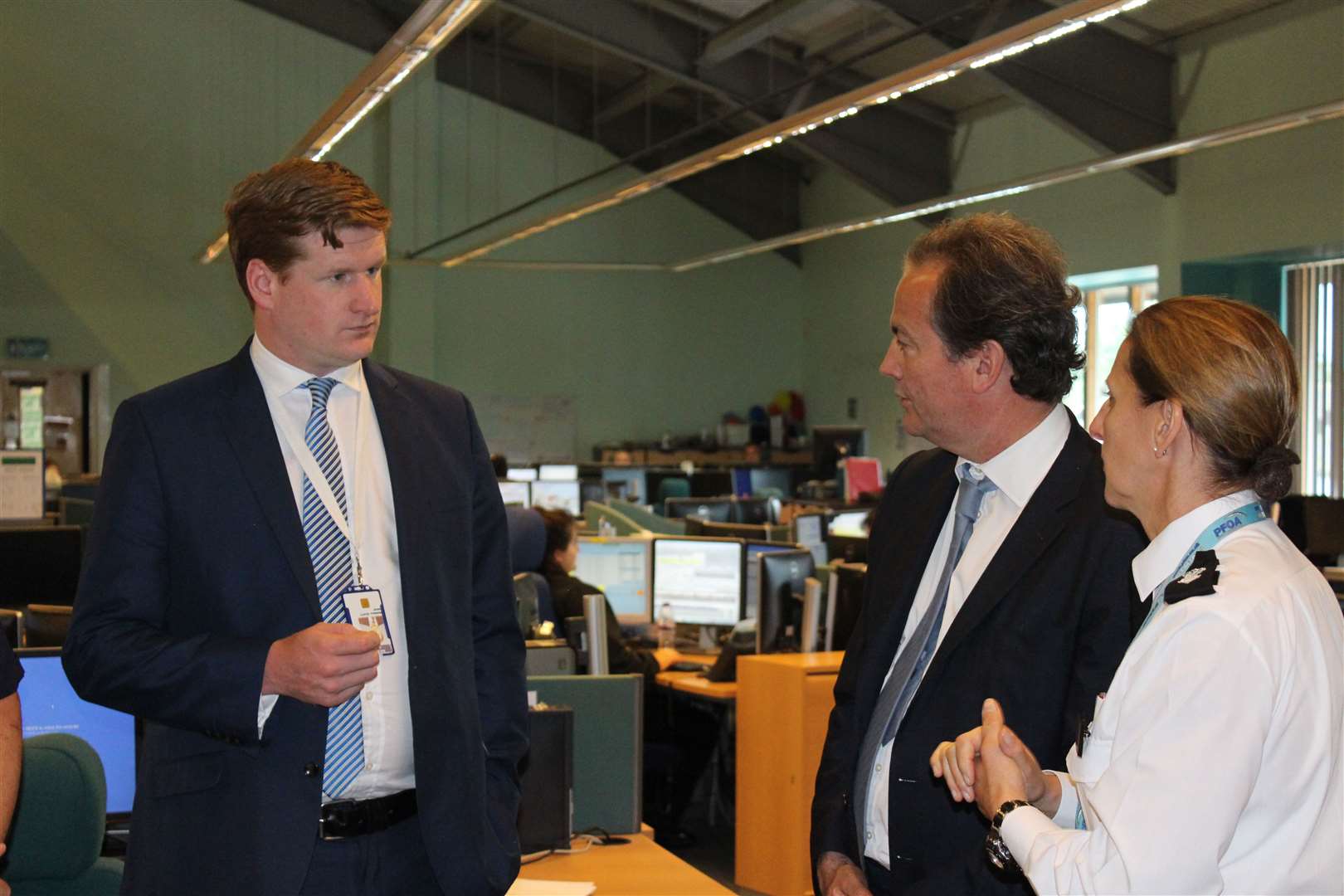 Matthew Scott. left, talking to Policing Minister Nick Hurd in the Kent Police Force Control Room