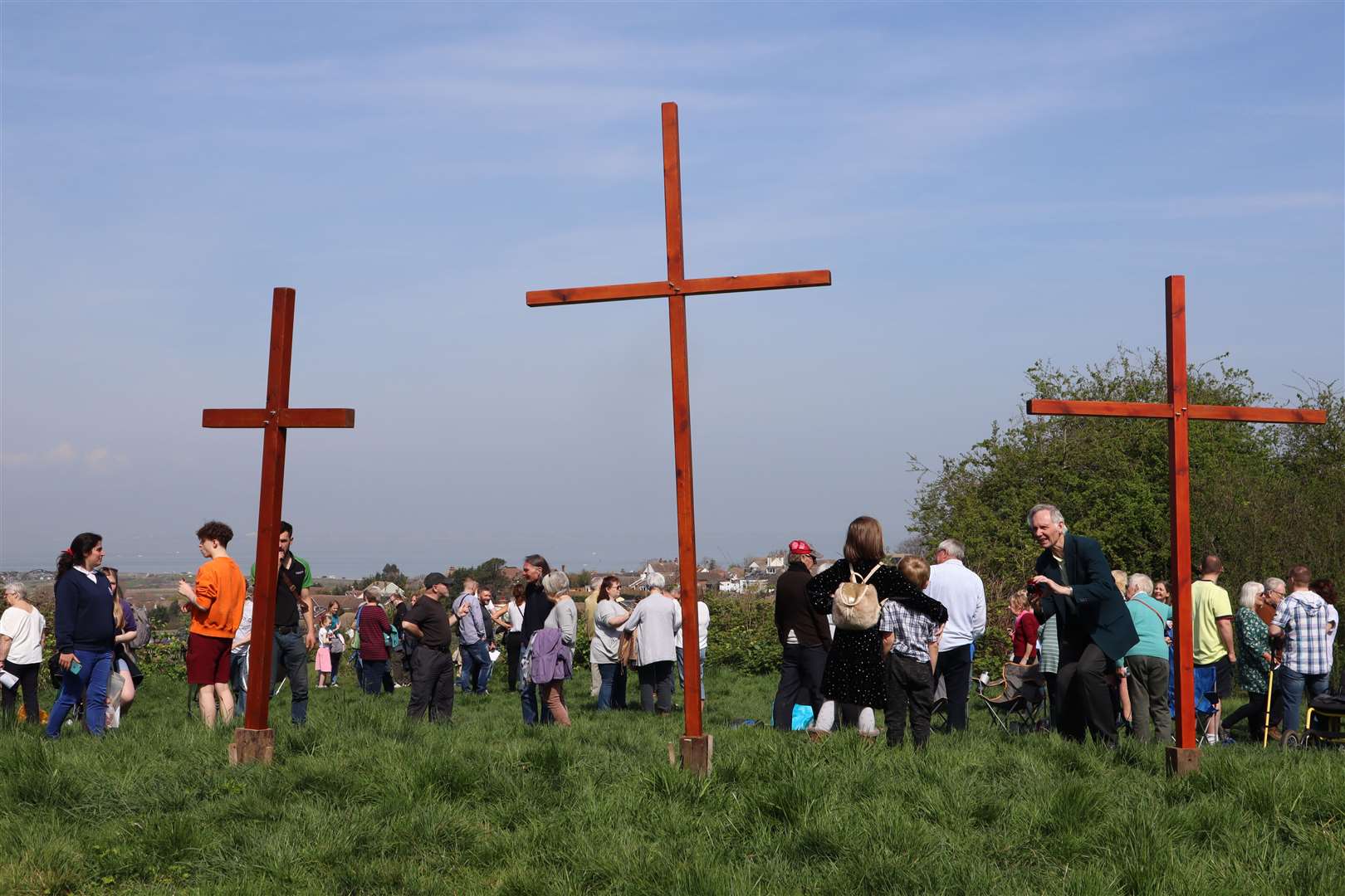 Three wooden crosses at the Good Friday Easter service at Bunny Bank, Minster