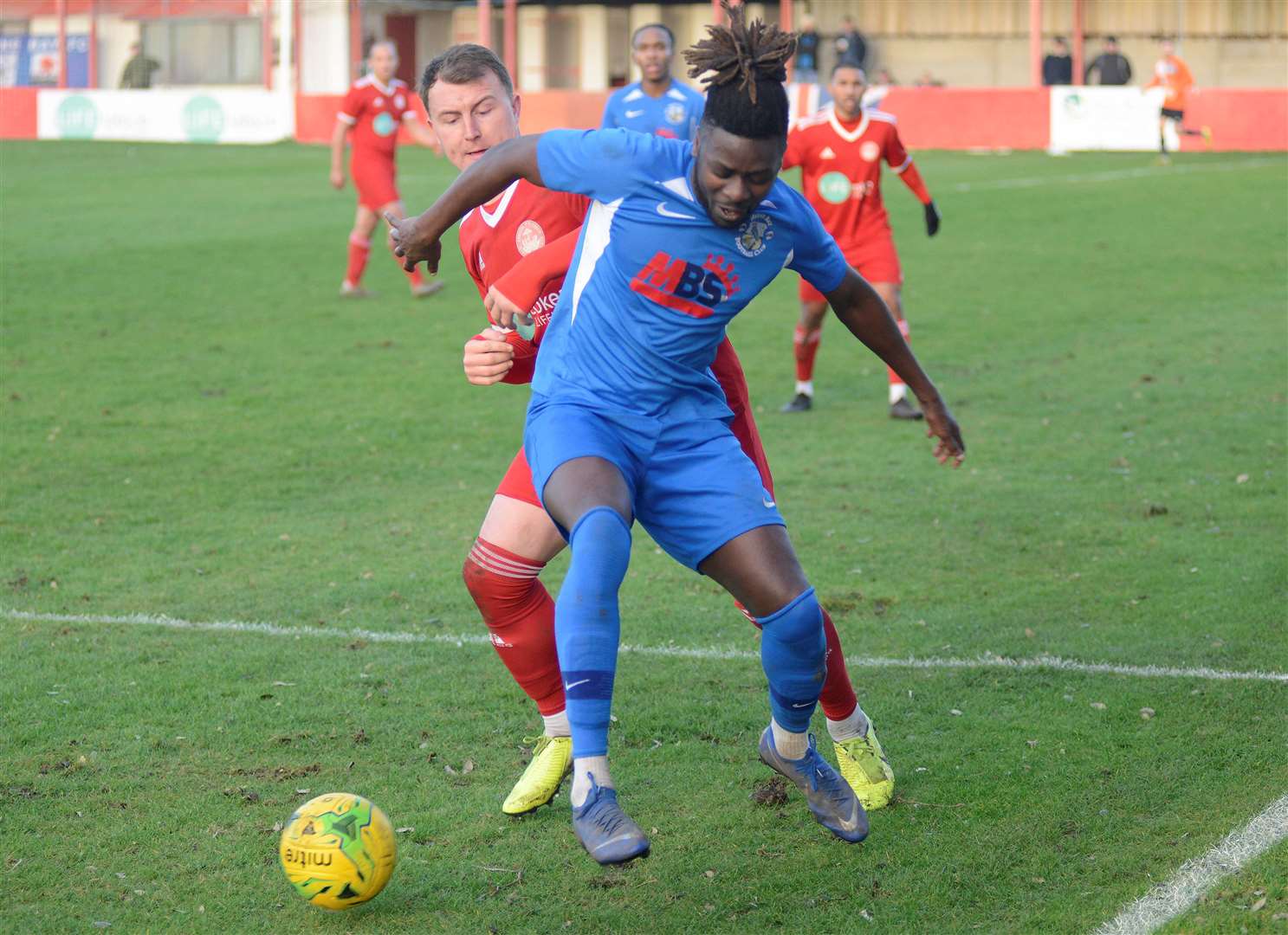 Bola Dawodu, pictured in action for Herne Bay at Hythe in 2020, has rejoined the club ahead of the new season in Isthmian South East. Picture: Paul Amos.