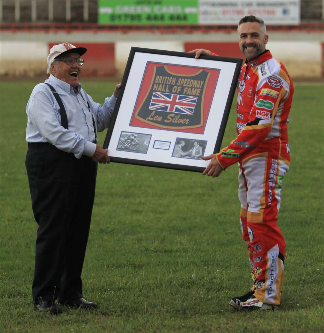 Len Silver is presented with his Hall of Fame vest by Kent captain Scott Nicholls Picture: Geoff Young