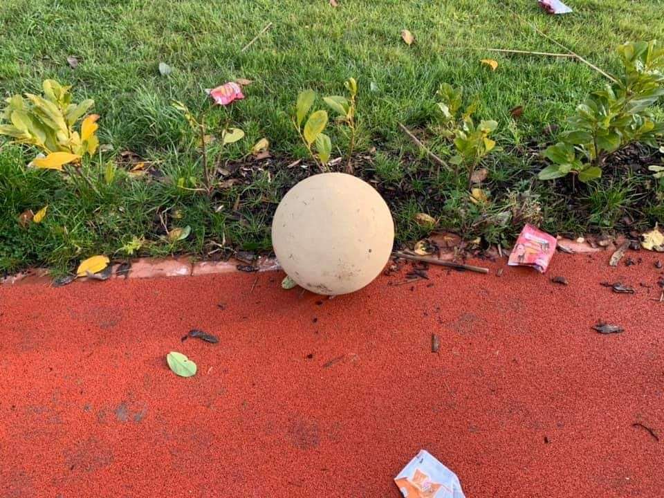 A concrete sphere from the entrance sign was found in the children's play area