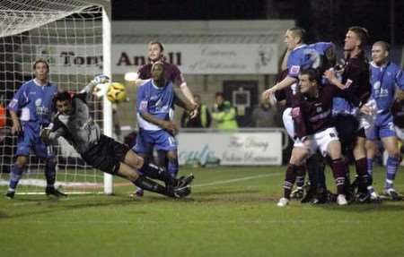 Gillingham's defence stands firm against another Northampton attack at Sixfields. Picture: ANDY PAYTON