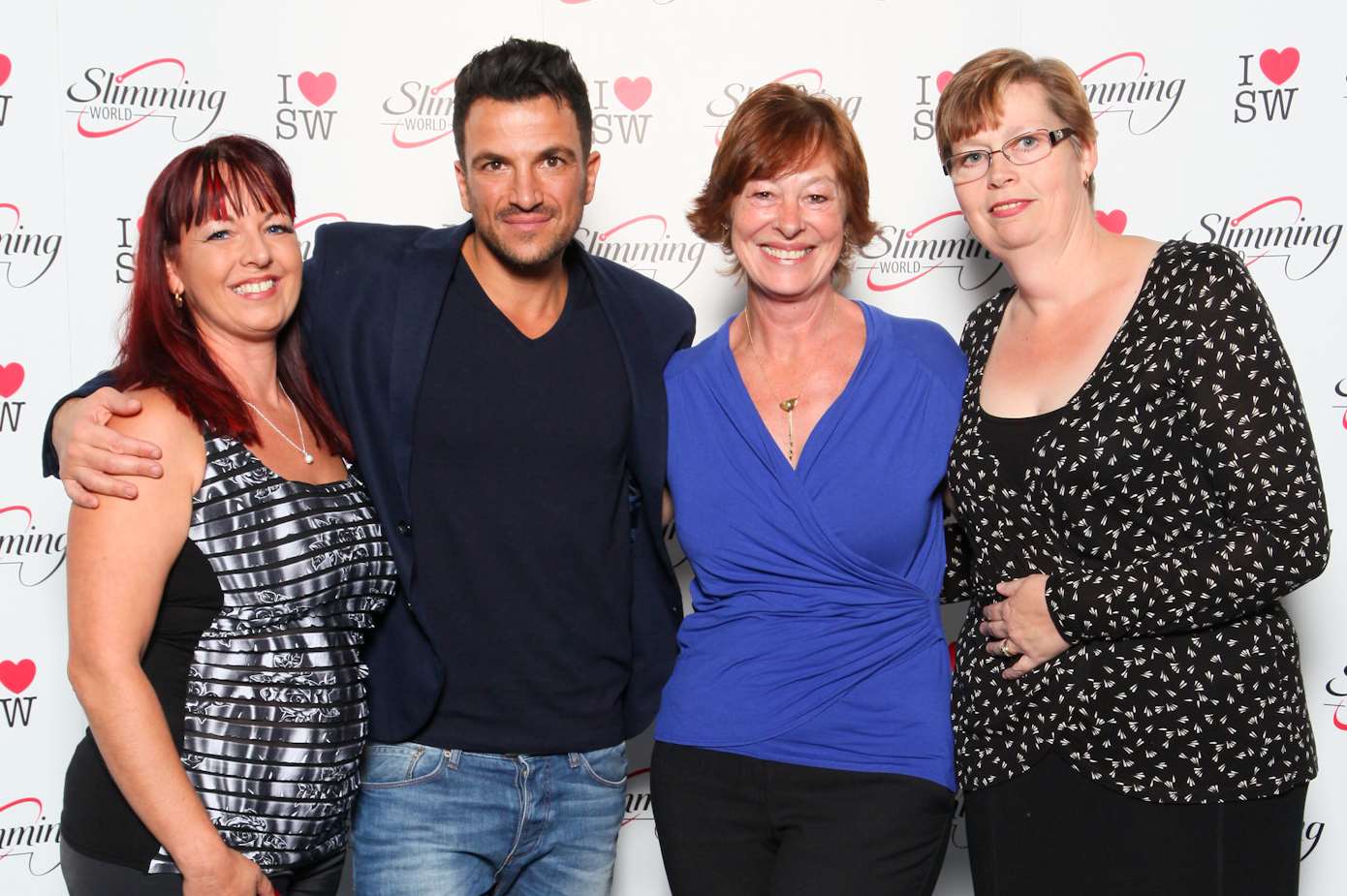 Slimming World Consultants cuddle up to singer and TV presenter Peter Andre (from left to right): Toni Heal, Julie Sinden, Tracey Open