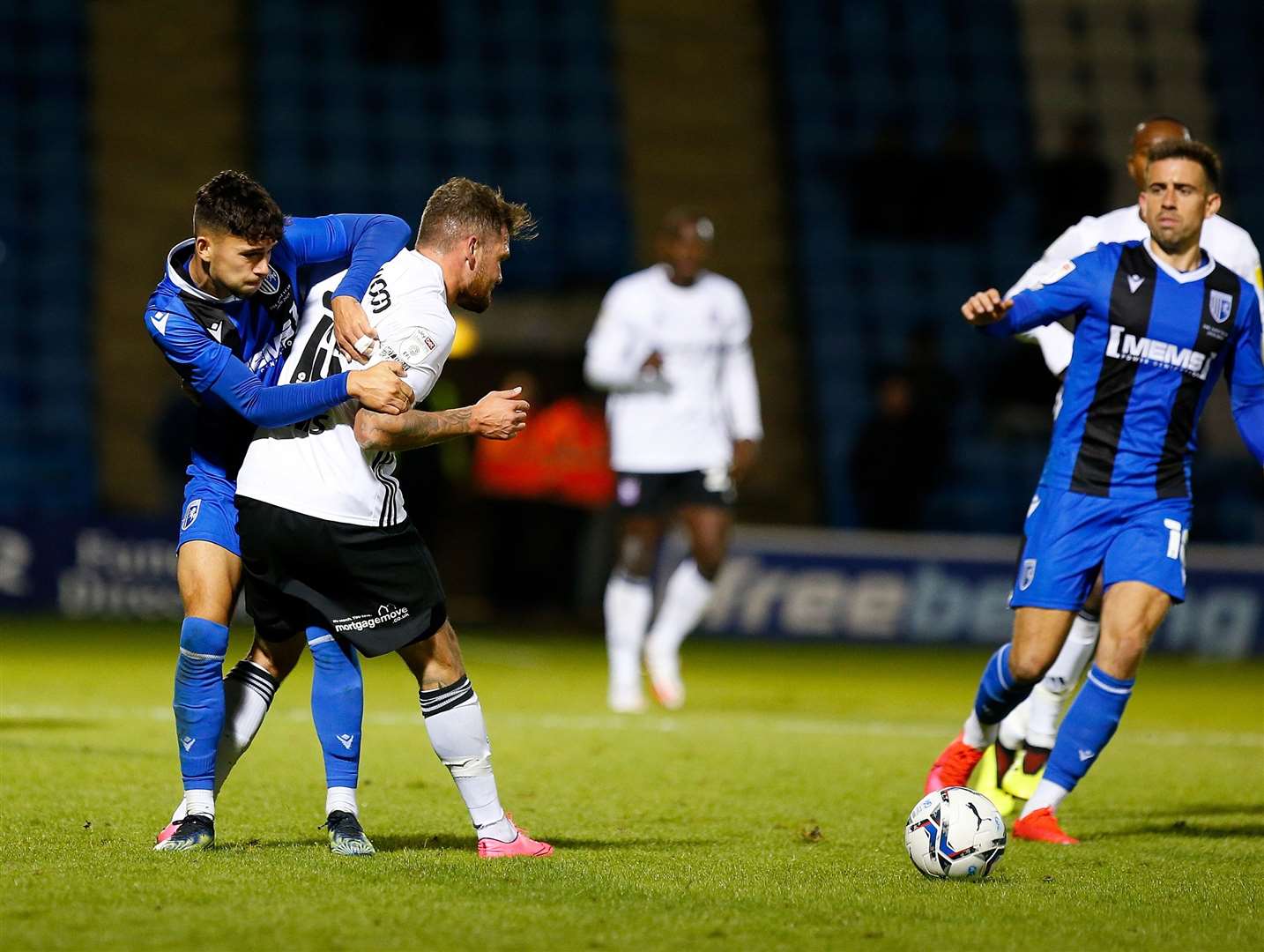Young Gillingham defender Bailey Akehurst in the thick of the action against Ipswich Town Picture: Andy Jones