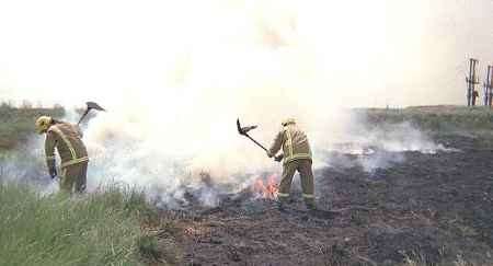 Firefighters tackle one of the blazes. Picture: KENT FIRE BRIGADE