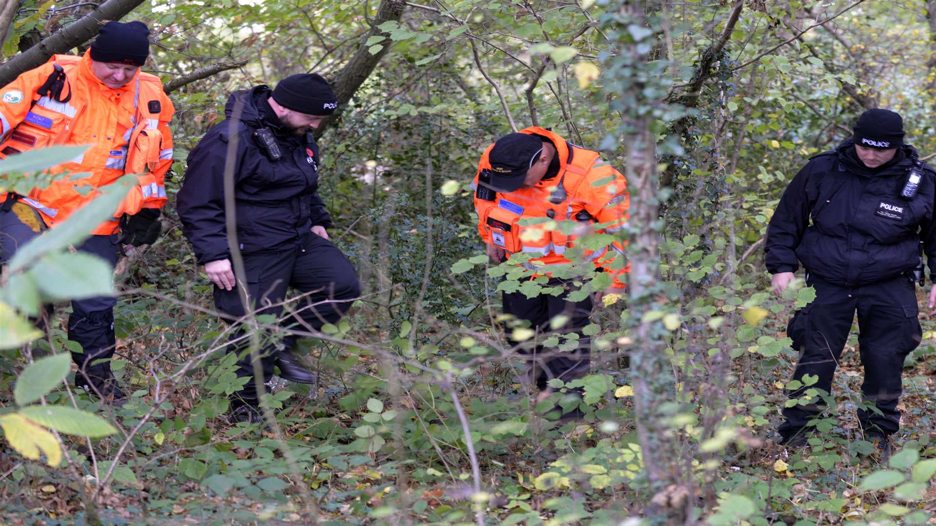 Police searching woodland for the missing dementia sufferer