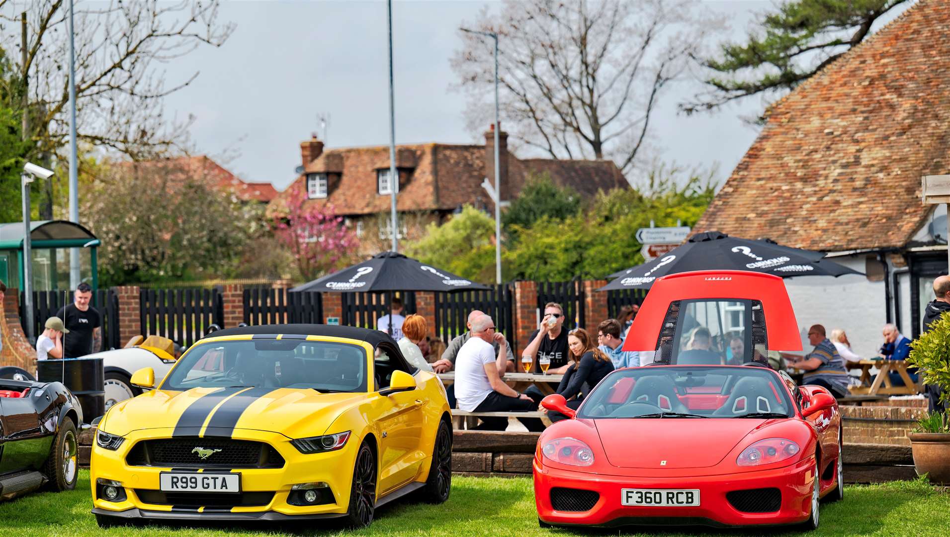 Car enthusiasts visited The Stag in Challock on opening weekend. Picture: Jason Dodd
