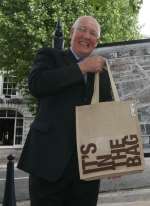 Town centre manager Bill Moss, with Maidstone's eco-bag. Picture: John Westhrop