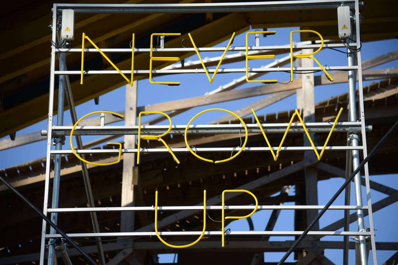 A 'Never Grow Up' sign at Margate's Dreamland, 2017. Picture: Gary Browne