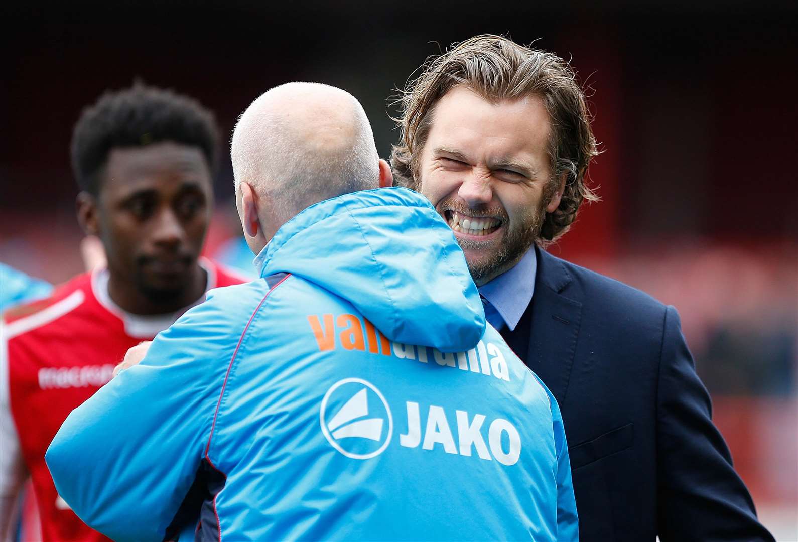 A delighted Daryl McMahon embraces assistant manager Steve Gritt Picture: Andy Jones