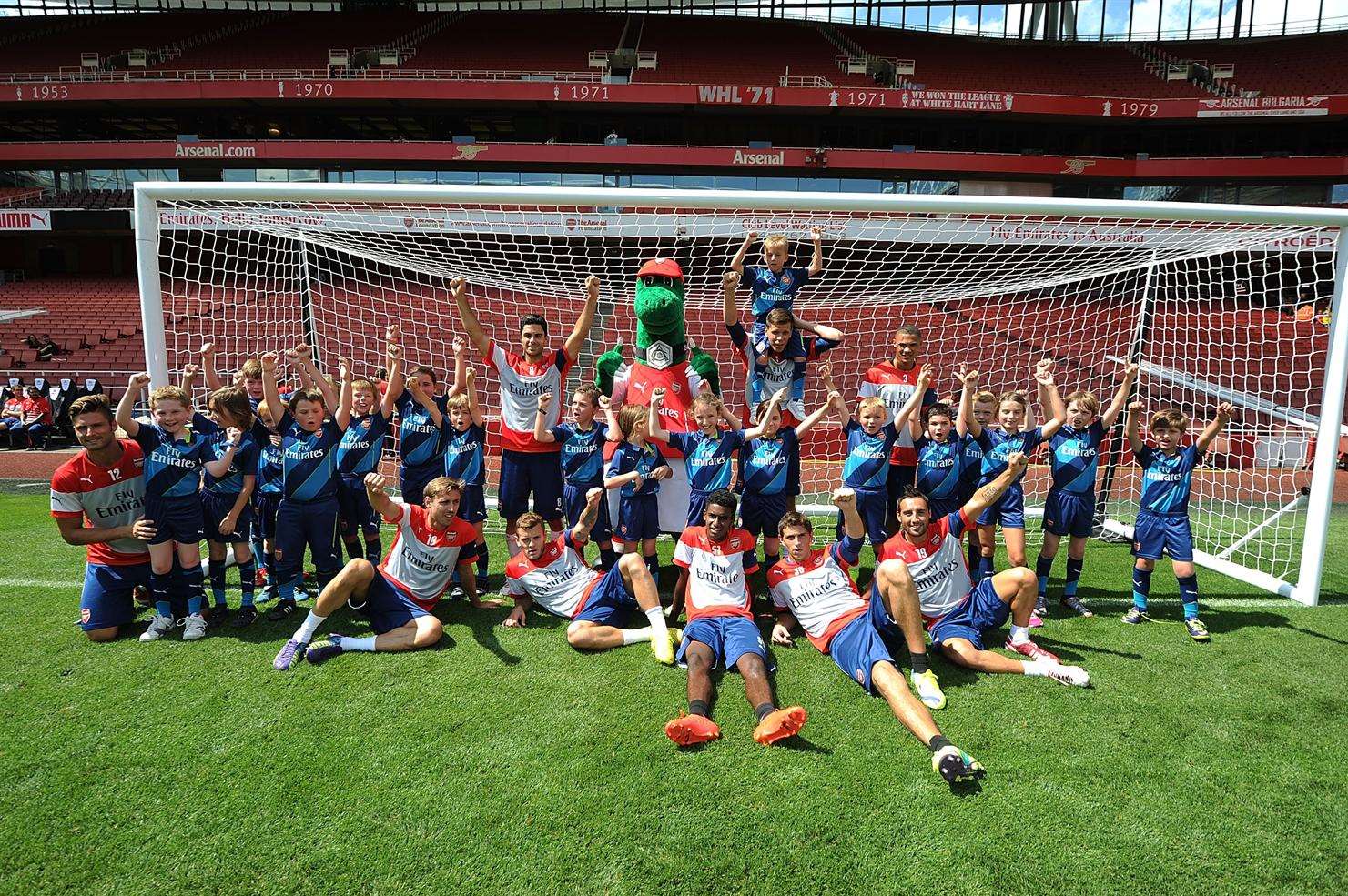 Jacob is third on the left of player Mikel Arteta. Picture Roxanne Wilson