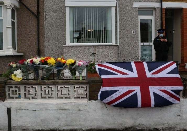 A policeman guards the property in Dartford Road. Photo: UK News and Pictures