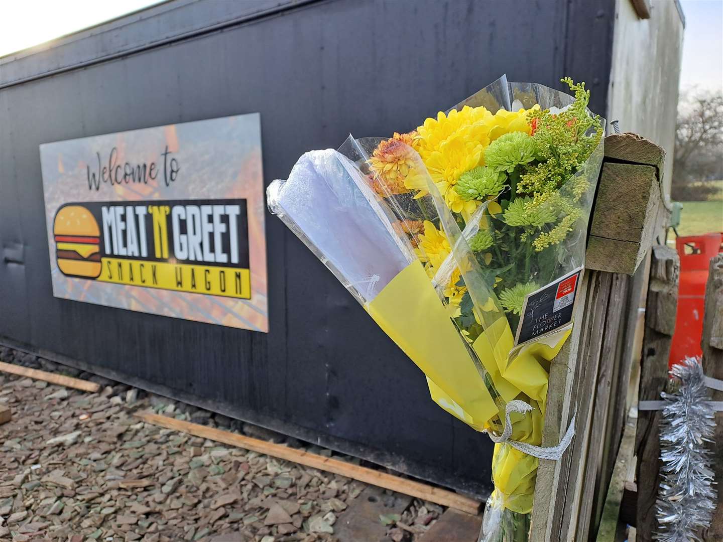 Flowers were left at the Meat 'n' Greet burger hut which Tyla says he will have to removed because of the tragic memories