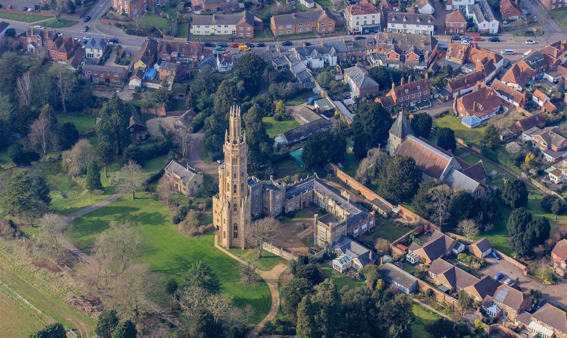 The tower is on offer with extensive grounds and sits in the village of Hadlow Picture: SWNS