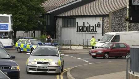 Police officers approach the van in the centre of the city. Picture: PAUL DENNIS