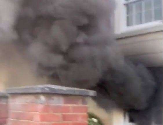 Thick smoke could be seen billowing from the property. Picture: Abdul Talaash