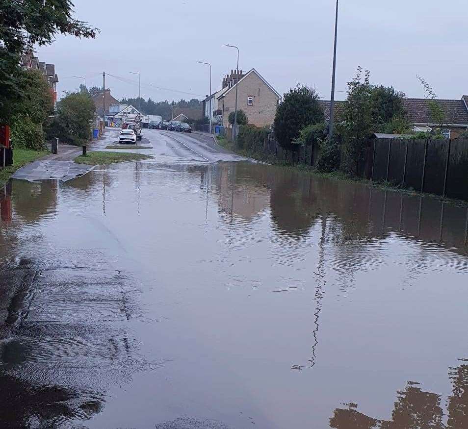 Grovehurst Road looks more like a river this morning. Picture: Alex Matthews