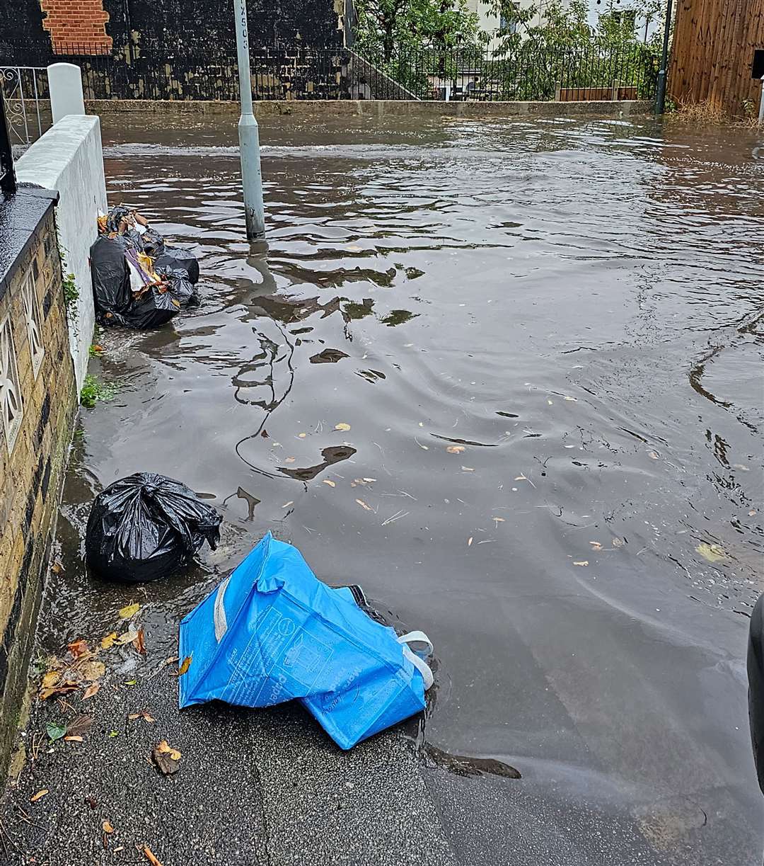 Longley Road in Rochester has been flooded since 9am. Picture: Kia Lydia