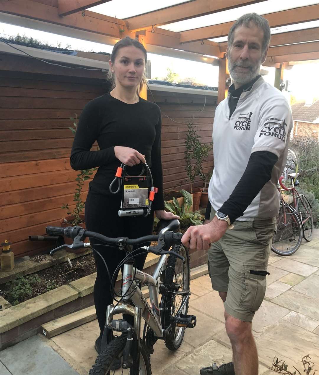 Inna Pashkevych and Duncan Edwards with her new bike and chain