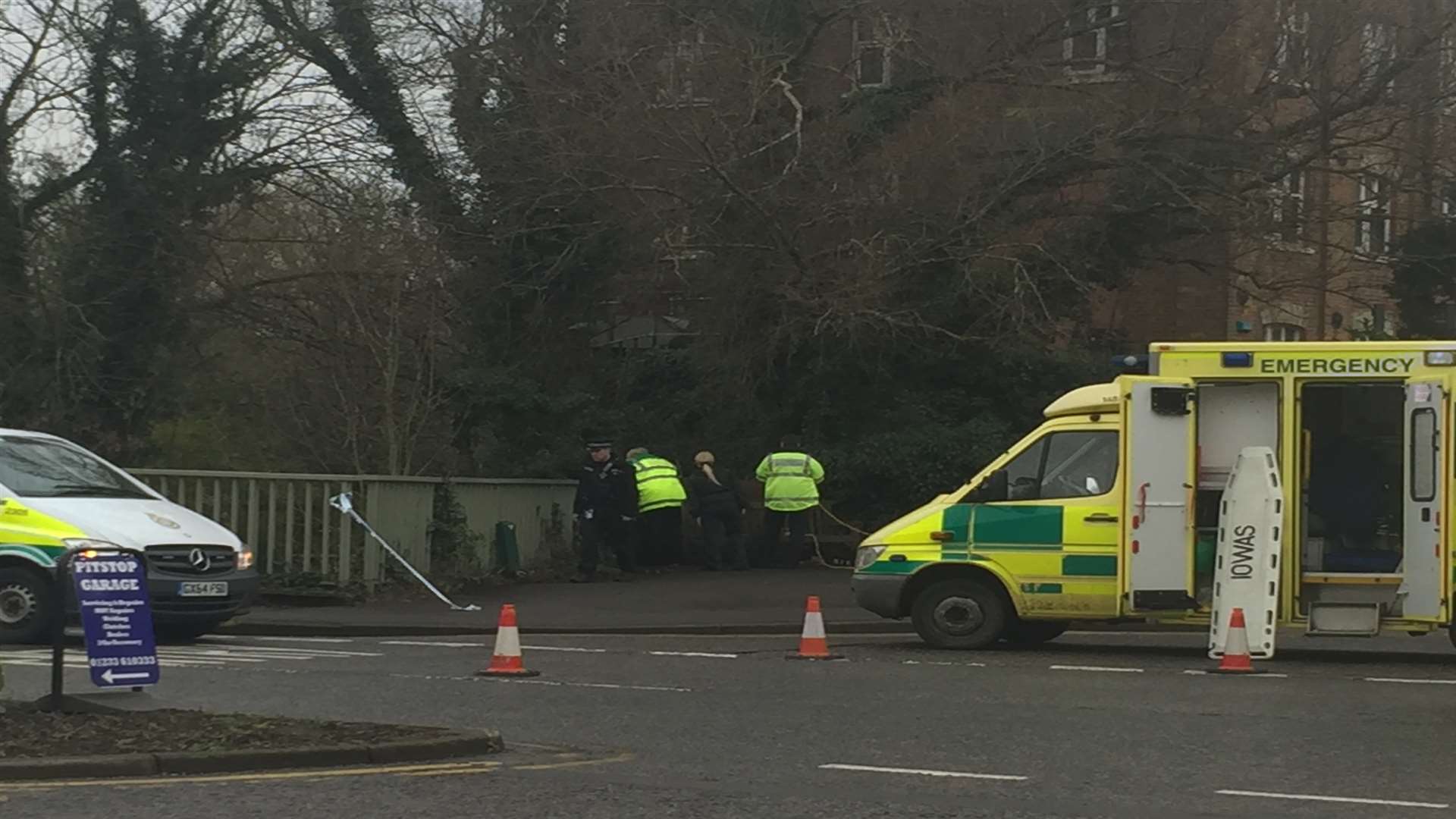 Emergency services gather to reports that a body has been found in East Hill, Ashford