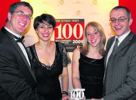 Holiday Extras staff Mike Whiting, managing editor; Anouk Agussol and Suzanne Spratley, group people executives; and Callum Johnson, group head of people and development at the presentation of Sunday Times Best 100 Companies to Work For.