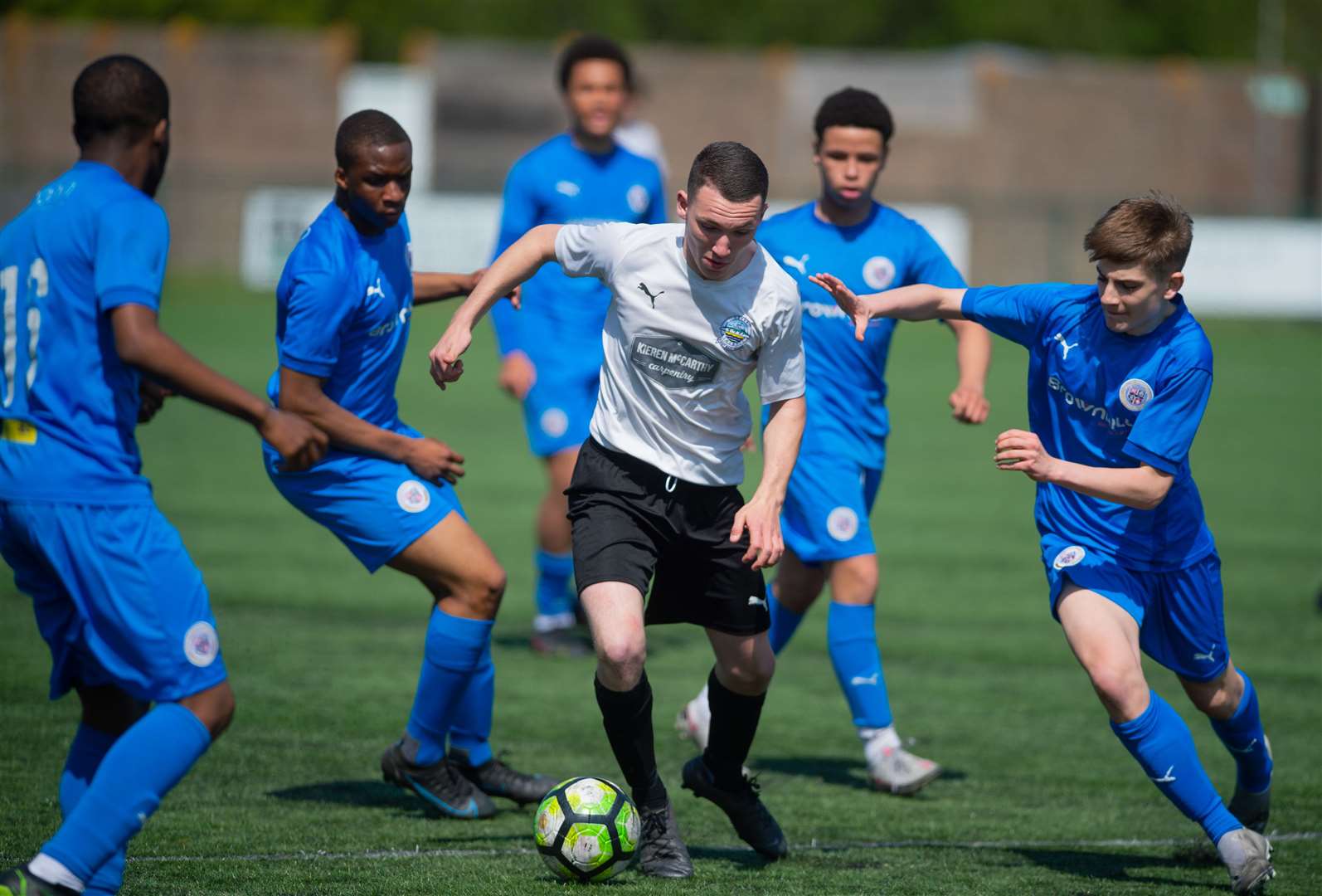 Dover Athletic under-16s (white) find themselves crowded out against Bromley under-16s. Picture: PSP Images