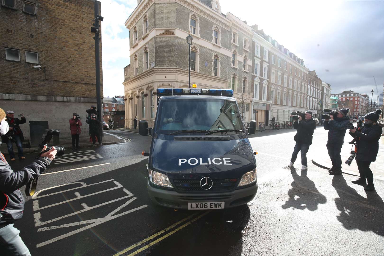 A police van arrives at Westminster Magistrates’ Court on Saturday morning (Steve Parsons/PA)