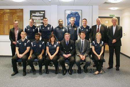 The first students, with officials, launch the Football Association’s new certificate in football business. From left: Barry Bright (Chairman of Kent FA and an FA Board member); Laurence Jones (National Business Development Manager); Paul Dolan (CEO Kent FA); Paul Morgan (Departmental Manager for Sport Management, Bucks New University); and Nigel Moore (Associate Lecturer, Bucks New University
