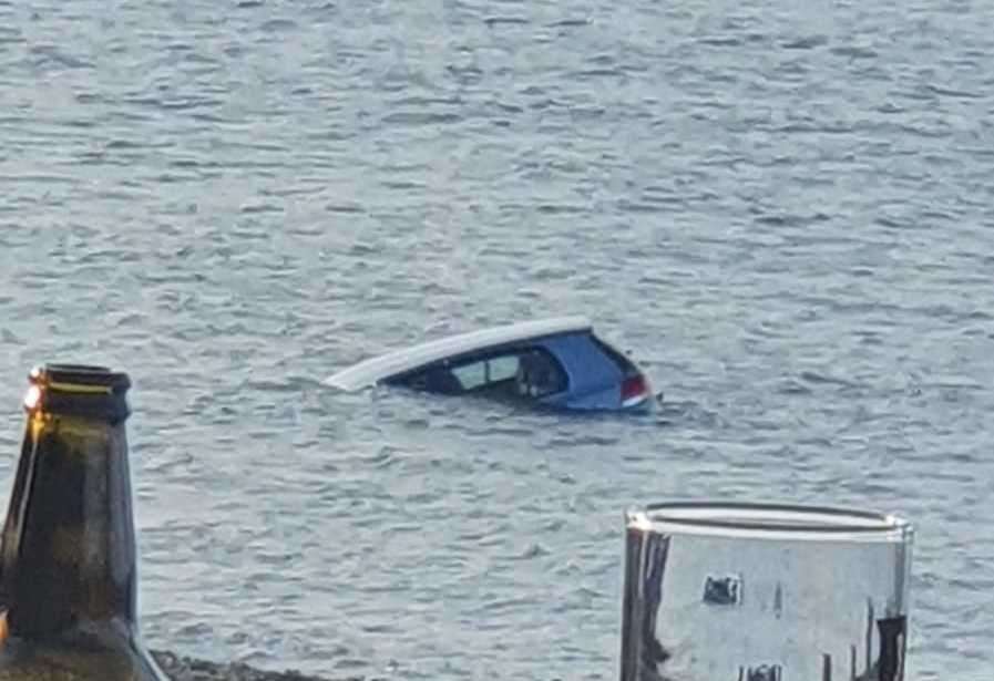 A car sinking into the sea in Whitstable. Pictures: Elliot Ashley