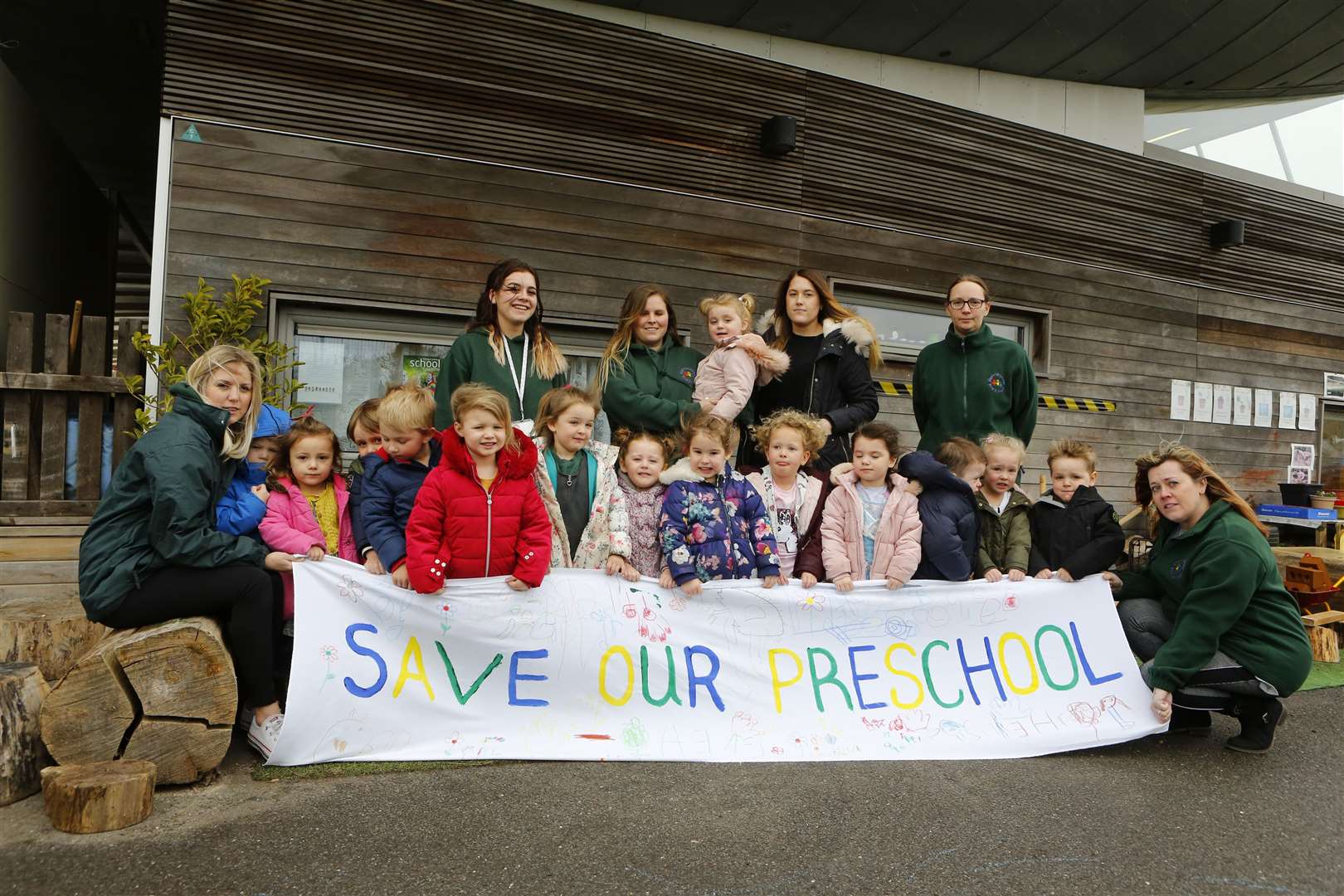 Children and staff at Harrietsham Pre-School pictured at the beginning of their 15-month plight to find a new home