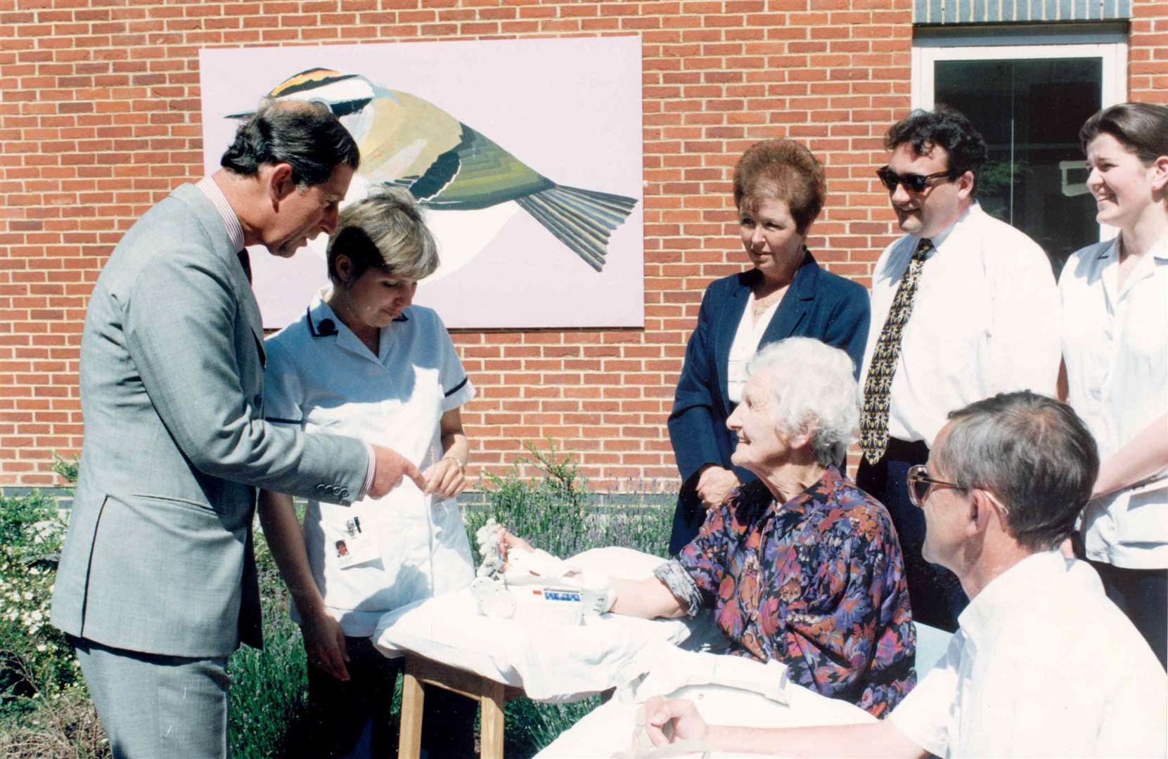 Prince Charles opened Thanet's hospital, names after his grandmother, the Queen Elizabeth the Queen Mother Hospital, in June 1996. Signed portraits of both the Queen Mother and the Prince of Wales have been given pride of place in the entrance hall. The Prince is seen here with physiotherapy patient Florence Hobson, 77, from Broadstairs