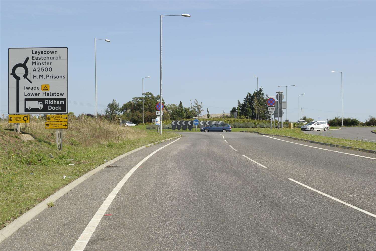 Views of roundabout and signage at Cowstead Corner