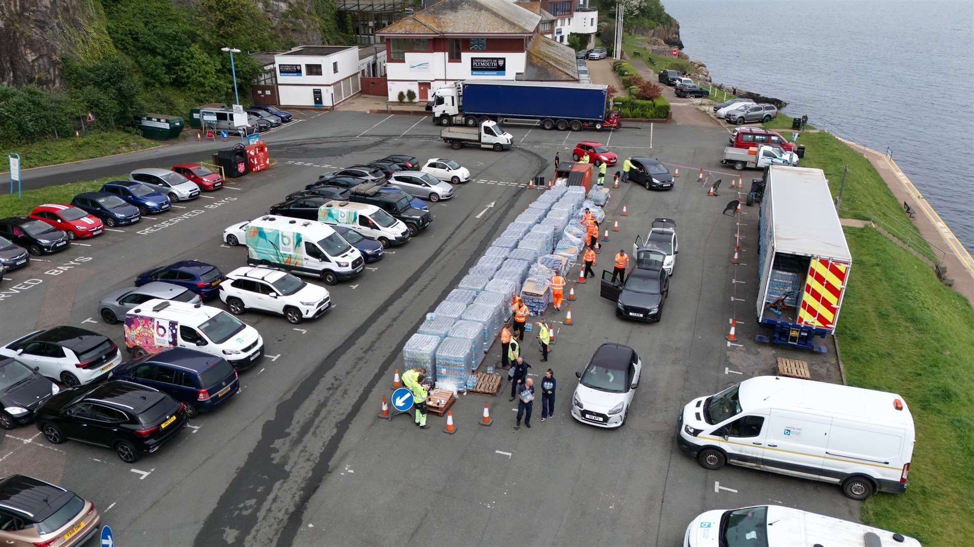 Bottled water being picked up at Freshwater car park in Brixham (Ben Birchall/PA)