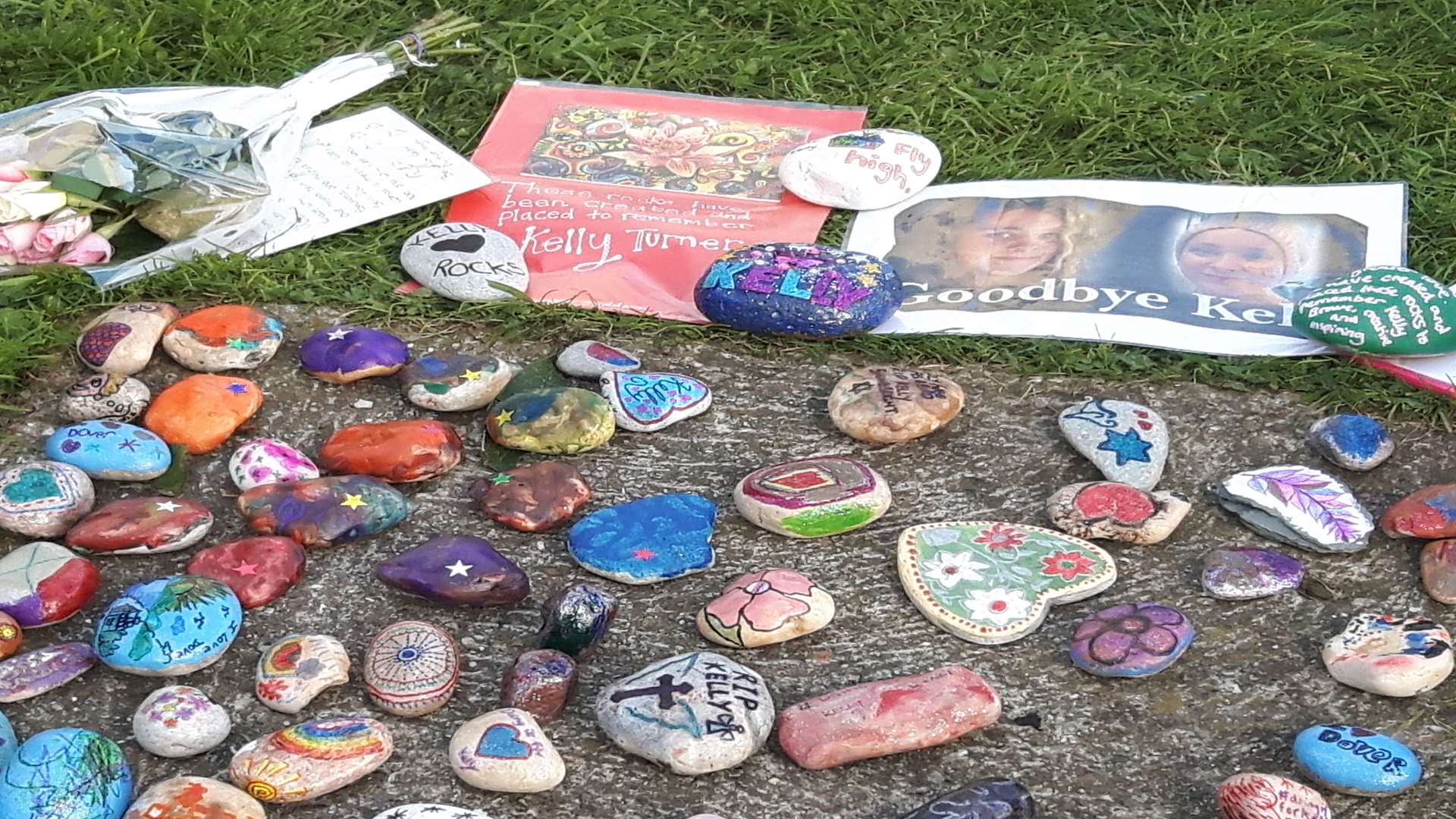 The tribute stones with messages for Kelly Turner