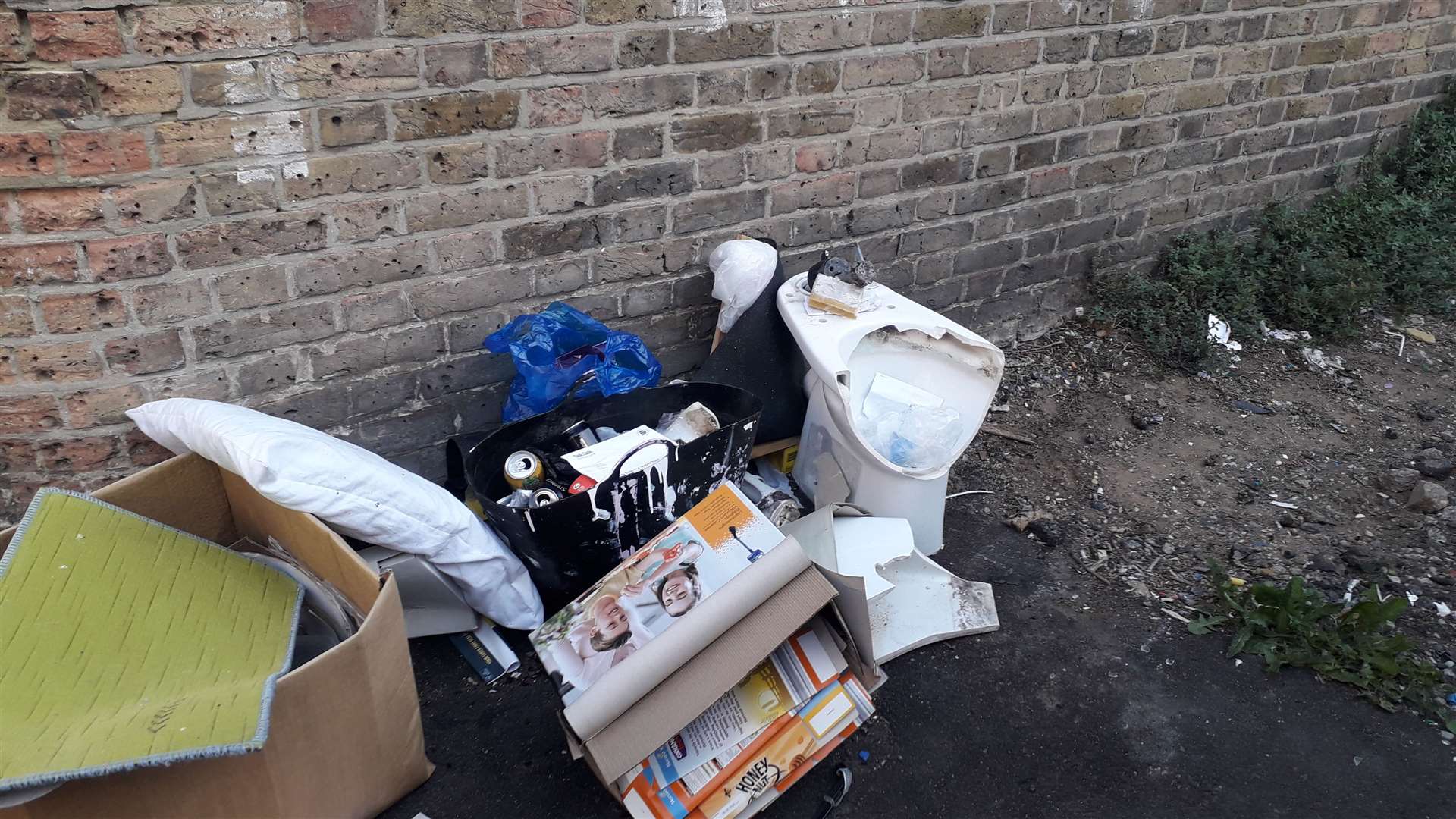 Belongings and a broken toilet left dumped in an alley. Picture: Thanet District Council