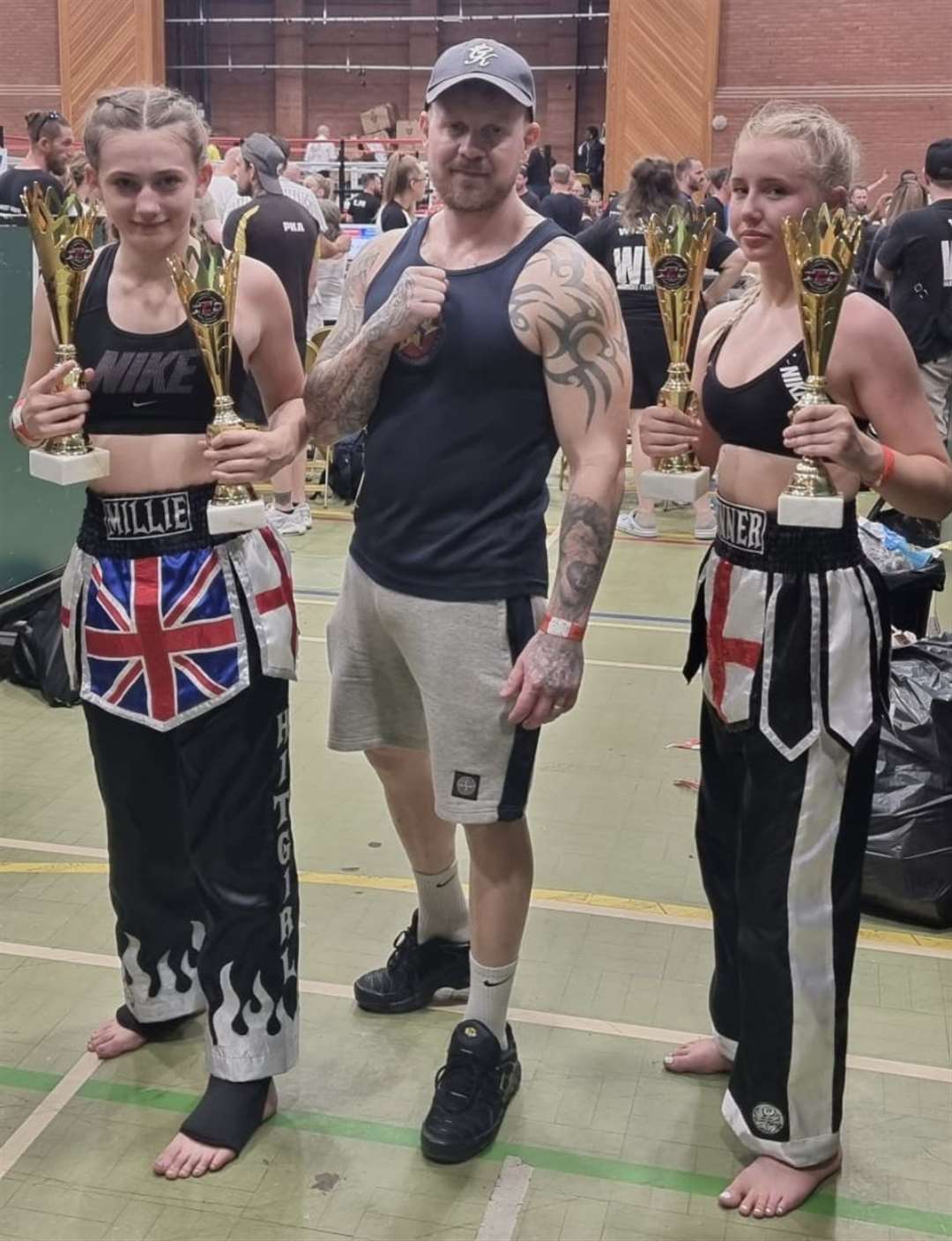 Millie Greenfield and Lexie Gunner, right, pictured with Paul Haworth, were in winning form once again for Star Kickboxing and Boxing Gym