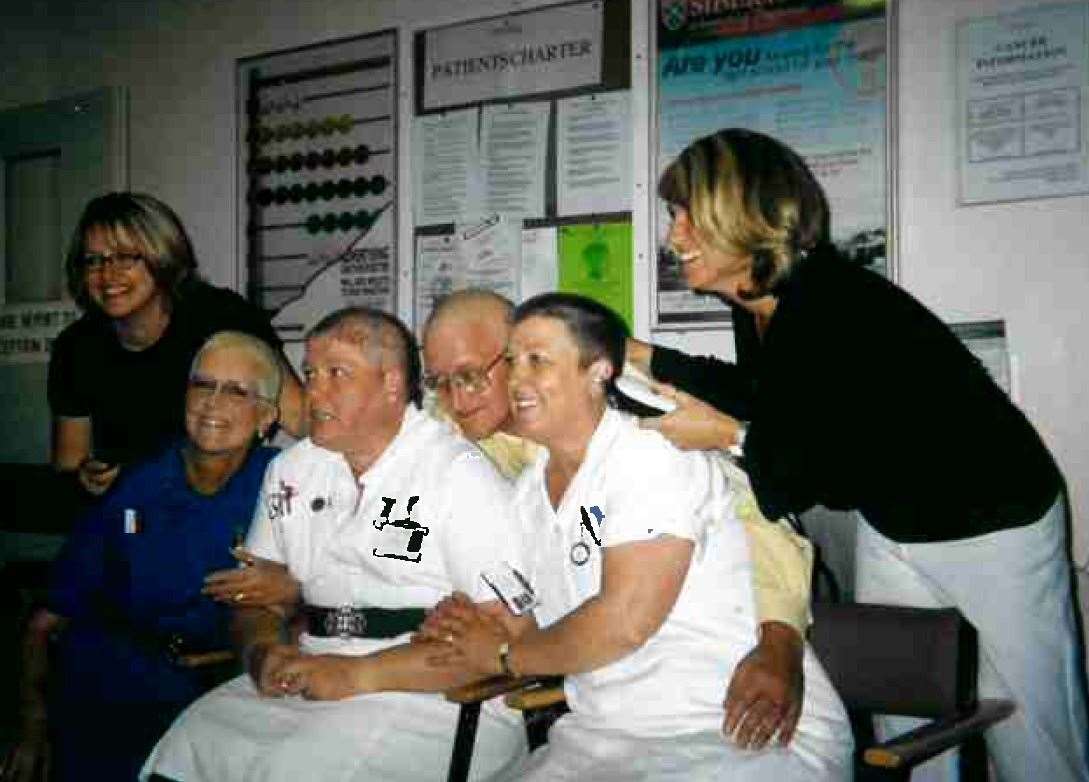 Roz (third from the left) with her colleagues who shaved their heads when she was undergoing treatment for breast cancer. Picture: East Kent Hospitals trust