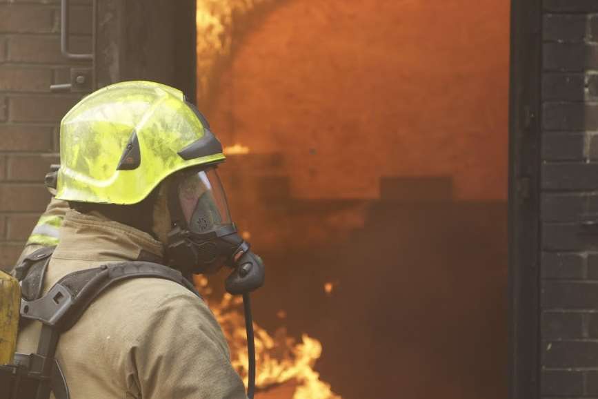 Firefighters wearing breathing apparatus tackled the blaze. Stock picture