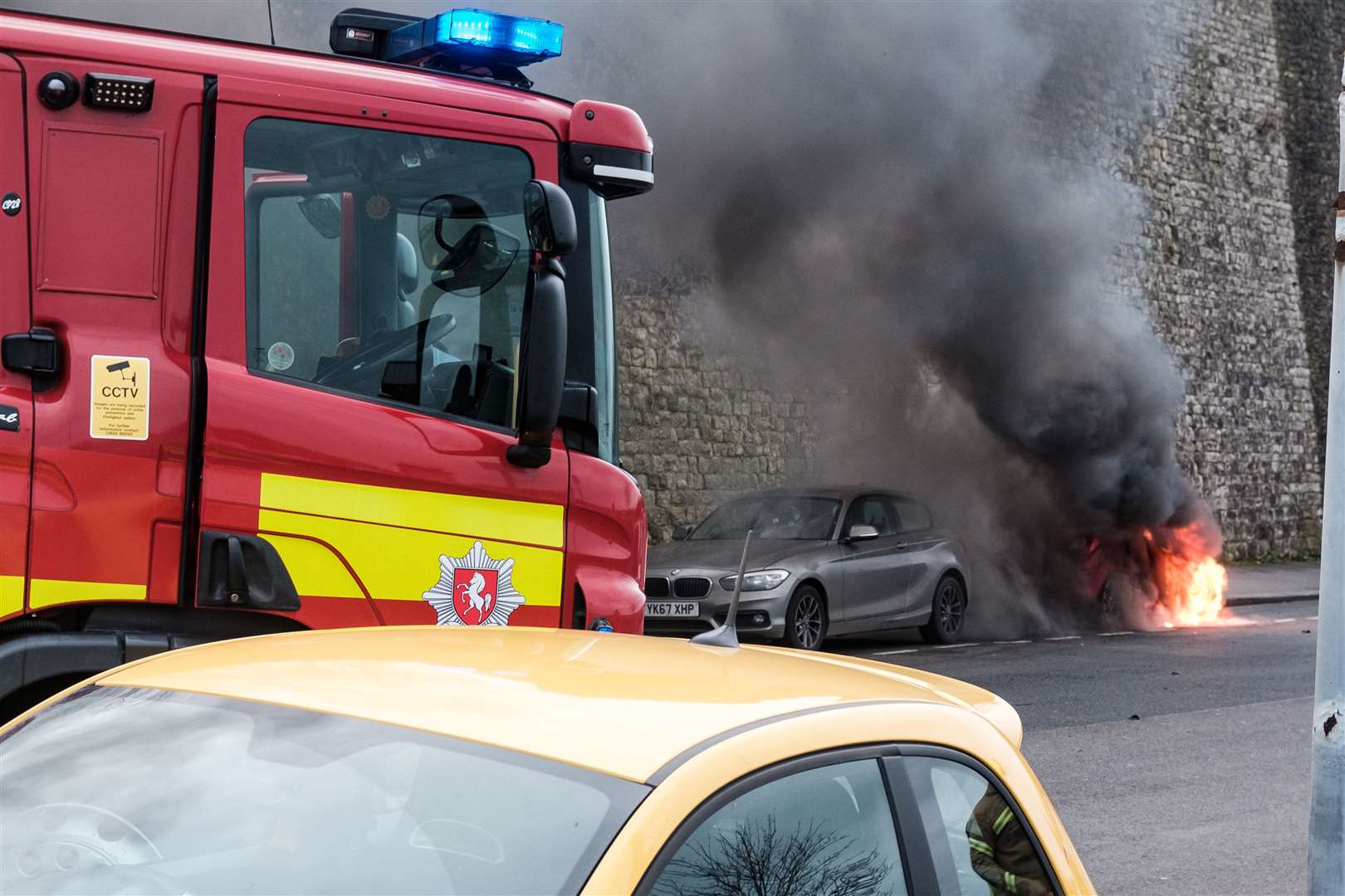 Firefighters doused the flames before it spread to nearby vehicles. Photo: Yousef Al Nasser