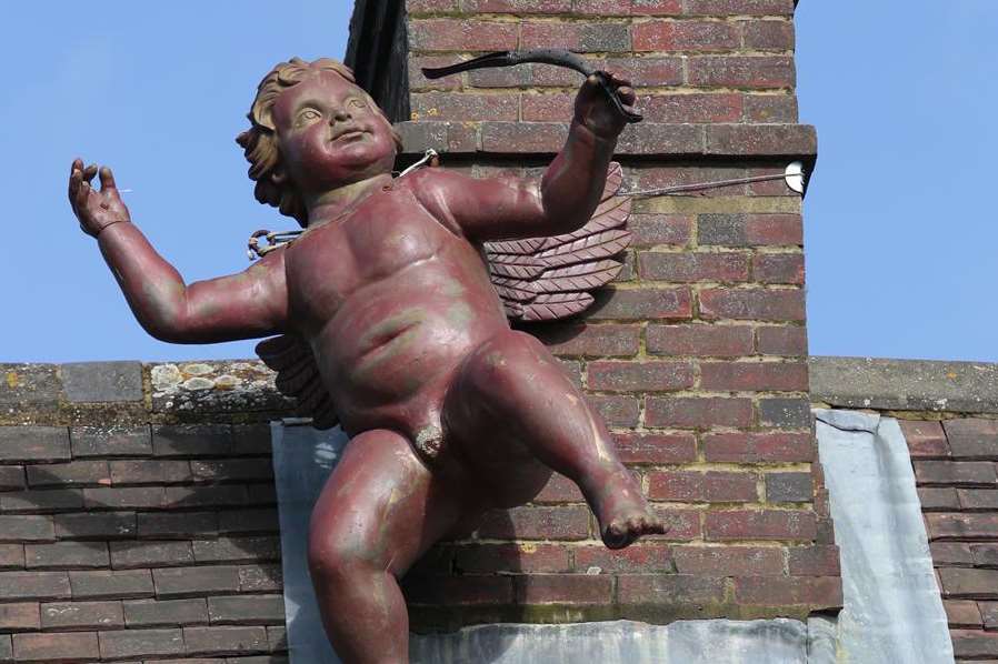 Cupid stands guard over Tony's chimney in Lenham