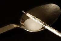 A spoon used for injecting heroin