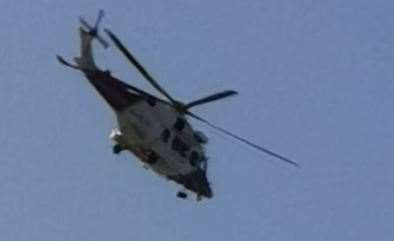 The HM Coastguard helicopter above Capel-le-Ferne. Picture: Bobbie-Louise Willis